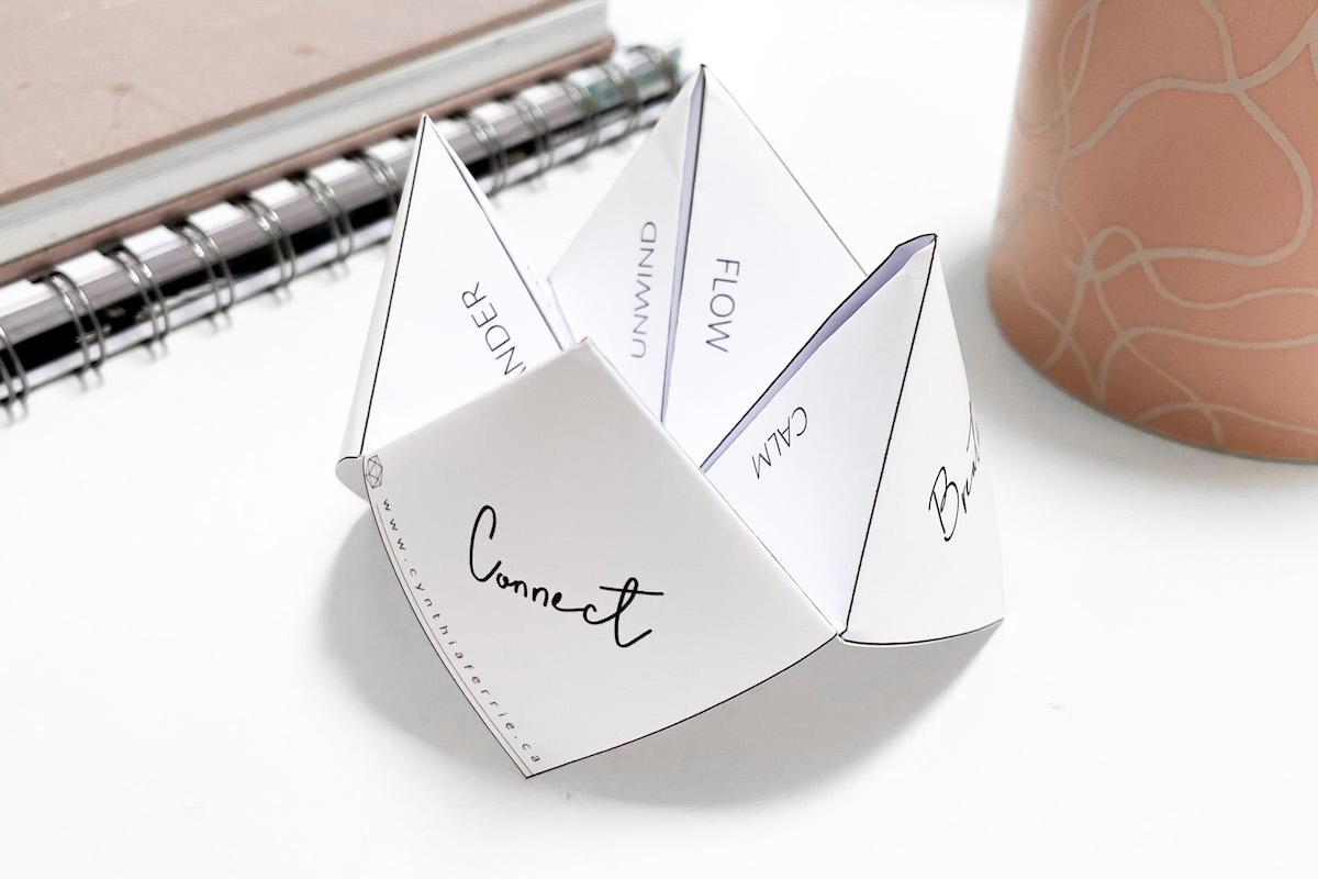 A cootie catcher designed to help you get in flow with your intuition. If you don't know what a cootie catcher is, I can describe it as one of those origami type fortune tellers from the 1980s